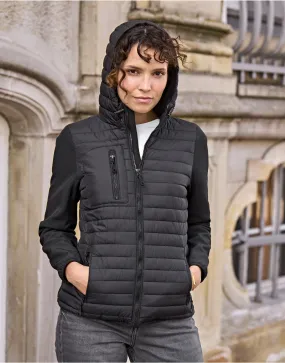 Tee Jays Ladies Hooded Crossover Jacket | Showerproof Puffer | Softshell Panels | Black | S-3XL